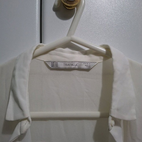 White semi-transparent Zara shirt used with pleats and collar