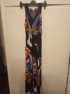 Maxi dress with lace back like new, colorful print on black base