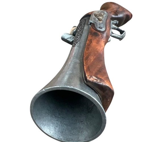 Decorative blunderbuss flintlock pistol used with wooden stock