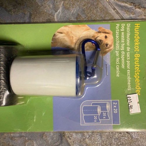 Hanging dispenser with 40 dog waste bags new