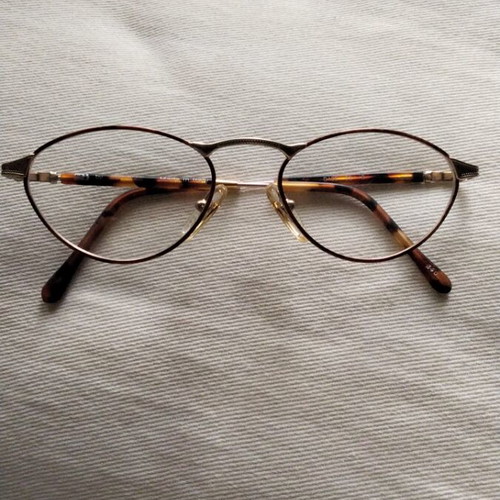 Vintage oval metal eyeglasses like new, gold and brown tortoiseshell