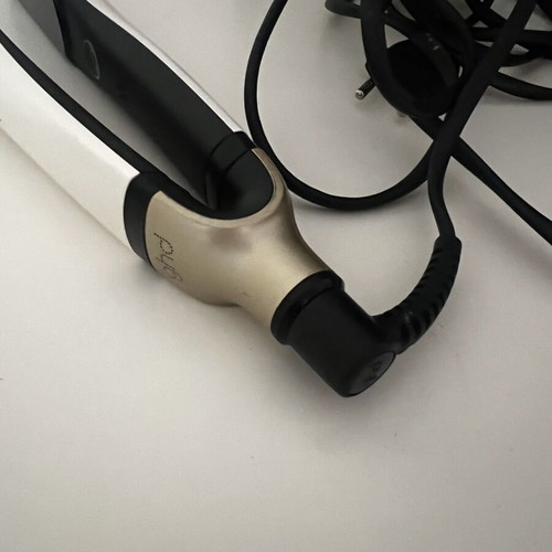 GHD Platinum+ hair straightener used for parts or repair