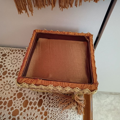 Vintage hanger and box in cinnamon orange color