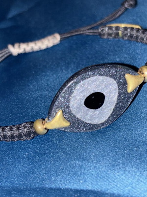 Anna Maria Mazaraki bracelet with eye design on black adjustable cord like new