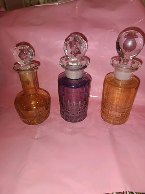 Set of 3 vintage perfume bottles with crystal stoppers like new
