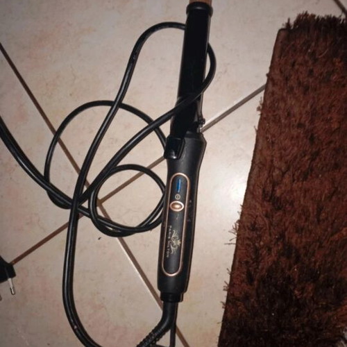 Curling device new, box only