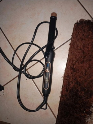 Curling device new, box only