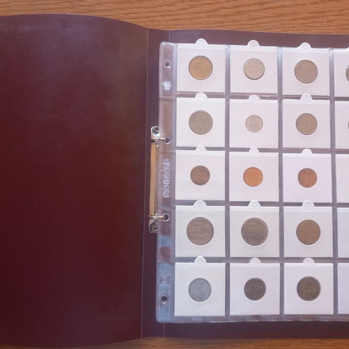 World coin lot used, 100 different coins in soft album