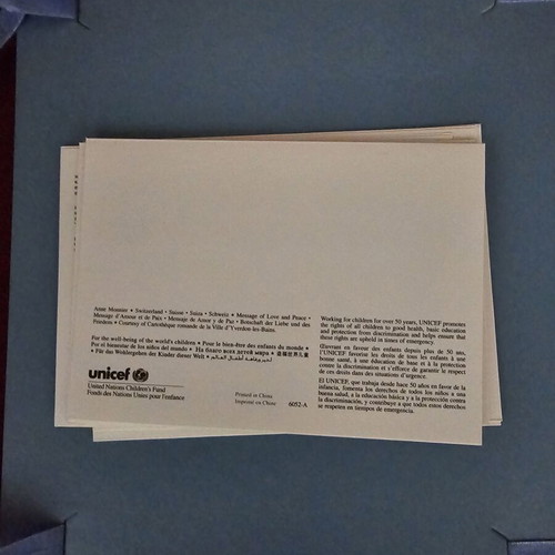 Vintage UNICEF collectible set with dossier and 6 cards
