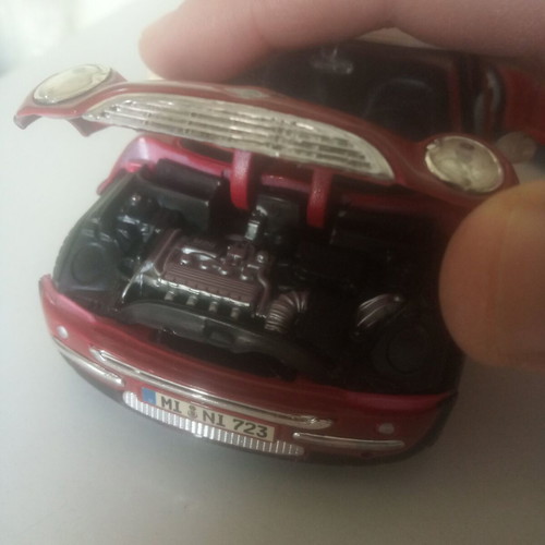 VW Beetle and Mini Cooper toy cars used, scale 1/24