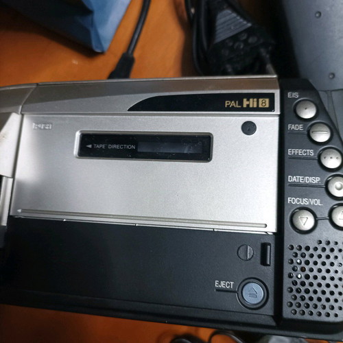 Hitachi video camera used with foldable screen and VHS cassette