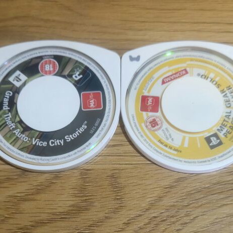 Sony PSP Street E1004 console with 8 top games and new charger