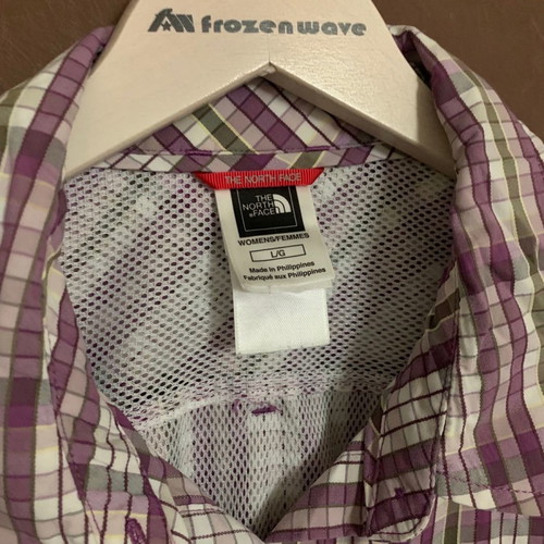 The North Face shirt used, women's large, white and purple
