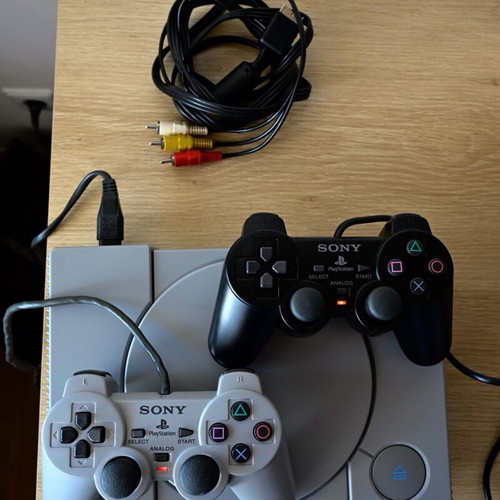 Sony PlayStation 1 SCPH-7002 Fat console used with 2 controllers and memory card