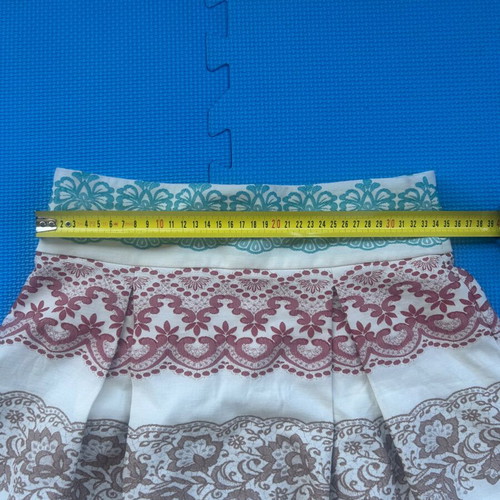 Pleated skirt Moutaki size small like new, multicolor