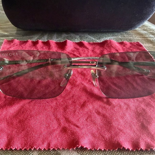 Gucci sunglasses with light blue lenses like new