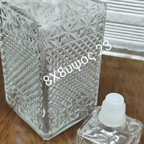 Vintage Glass Decanter with Embossed Geometric Design used