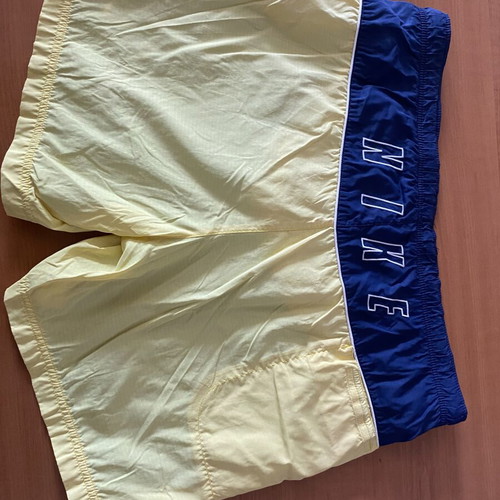 Nike men's swim shorts used, size M, blue and yellow