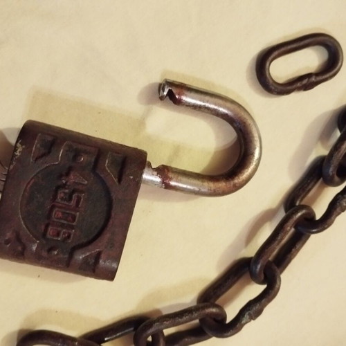 Padlock used with key, chain and skeleton key