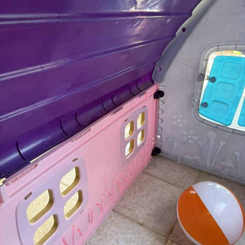 Children's plastic playhouse used, purple white and pink