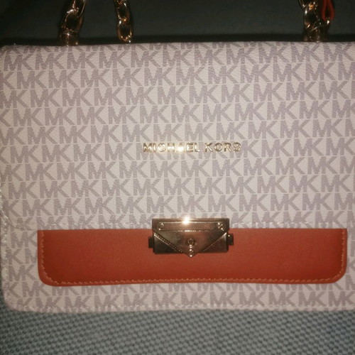 Shoulder bag used with strap for hand and shoulder