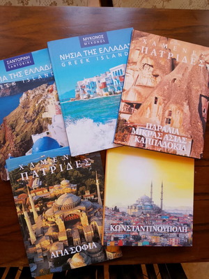 Collection of 5 hardcover albums like new, Lost Homelands and Islands