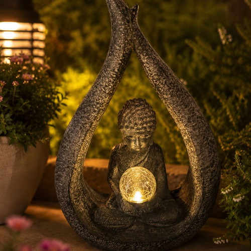 Solar Buddha garden lamp with stone-effect plastic, excellent condition