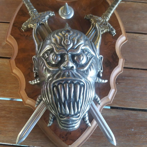 Decorative wall hanging used with swords