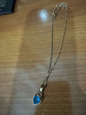 Necklace with blue heart used, not steel