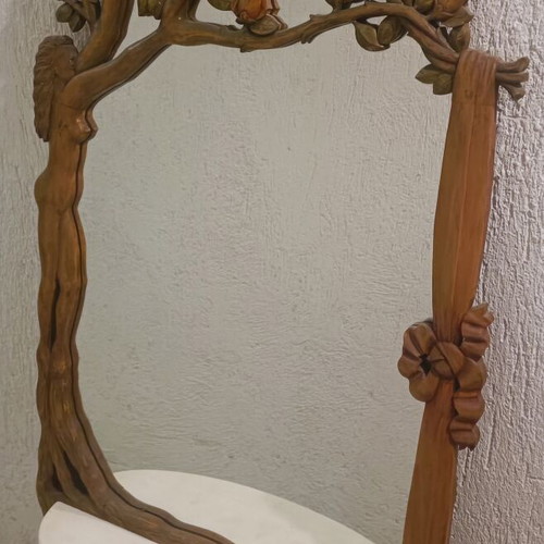 Wooden mirror with carved floral design and marble shelf like new