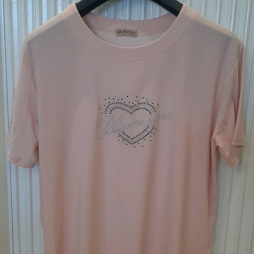Pink women's blouse used with silver detail