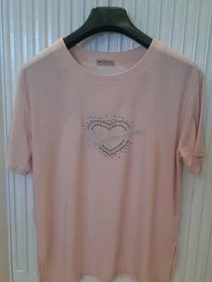 Pink women's blouse used with silver detail