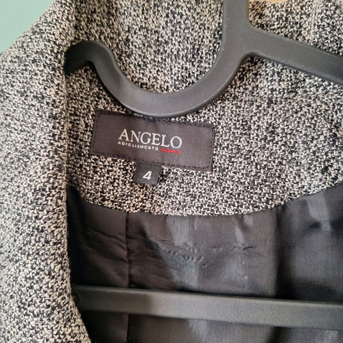 Vintage jacket like new, size medium, black and gray