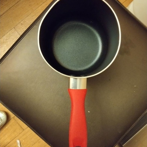 Presto Mini Tescoma saucepan 12cm red with slight rim bend
