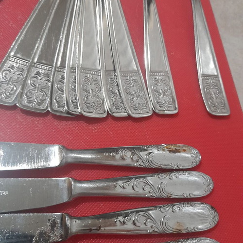 Cutlery set 24 pieces like new with coasters and opener
