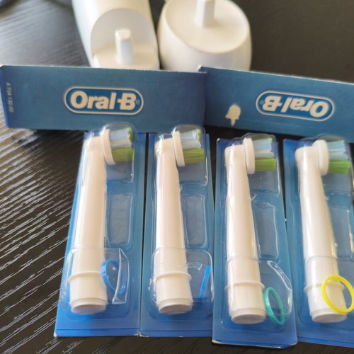 Oral-B electric toothbrush used with 6 replacement heads purple
