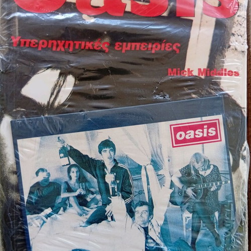 Oasis book with sealed CD like new