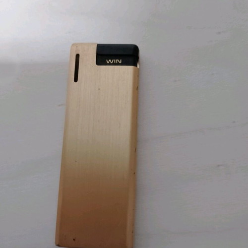 Win International vintage butane lighter used