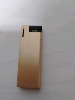 Win International vintage butane lighter used