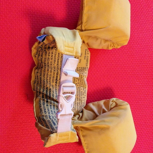 Child life jacket with integrated armbands used