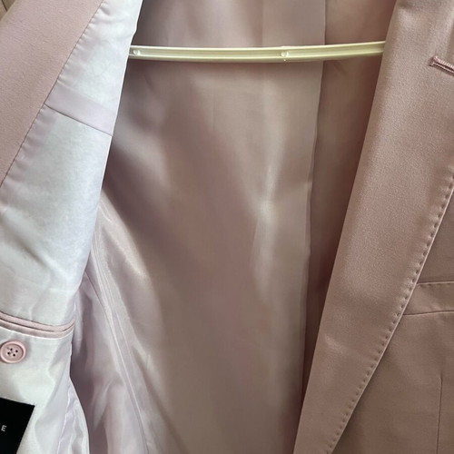 Pink suit medium EU size 46/48 like new