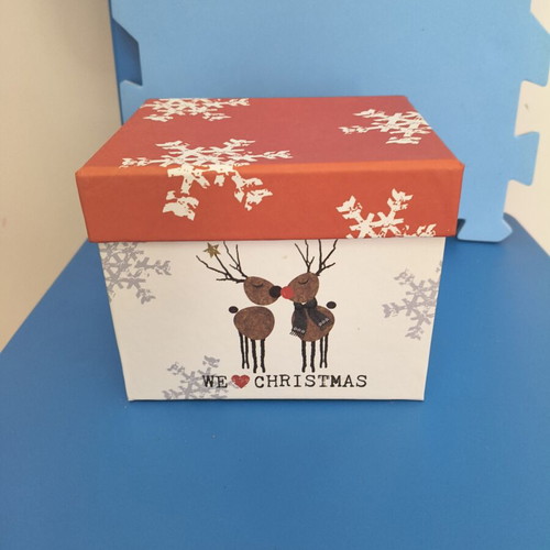 Christmas-themed mug with two reindeer