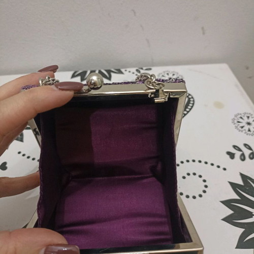 Clutch bag polygonal like new with purple sequins