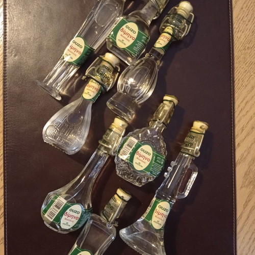 Miniature liquor bottles used, collection of 8 shaped like musical instruments