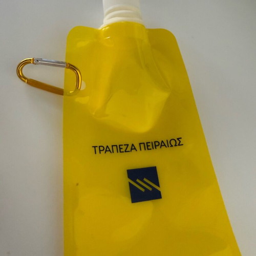 Water or electrolyte pouch new by Piraeus Bank plastic flask with belt ring