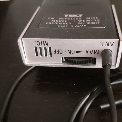 Wireless FM microphone used with case and prospectus