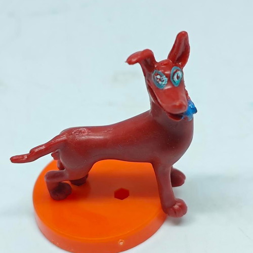 Vintage dog figure like new with orange base