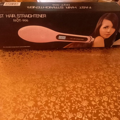 Electric hair straightening brush like new with box