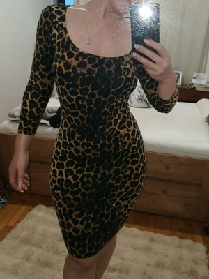 Animal print dress elastic like new, 3/4 sleeve, black and brown