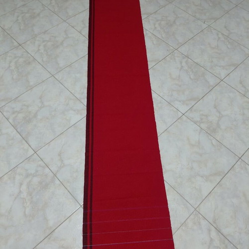 Traditional cotton fabric on loom, new, red with black stripes